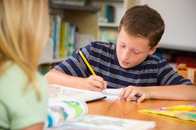 Child concentrating on class work